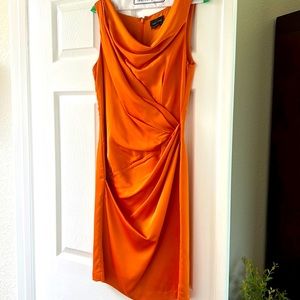 Worn one time beautiful rust/orange ruched cocktail dress